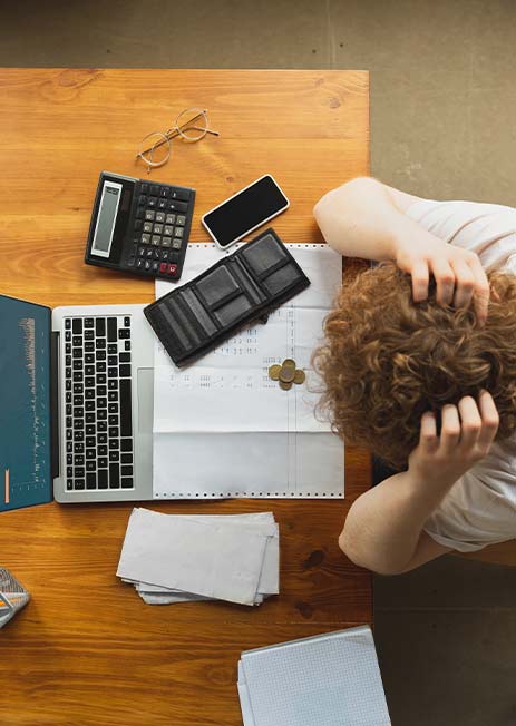 worried man in front of a computer